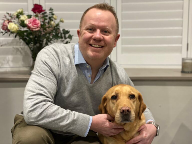 Chris Shales with golden labrador